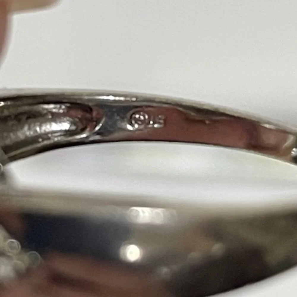 Sterling silver and London blue topaz and moisonnite cocktail ring.